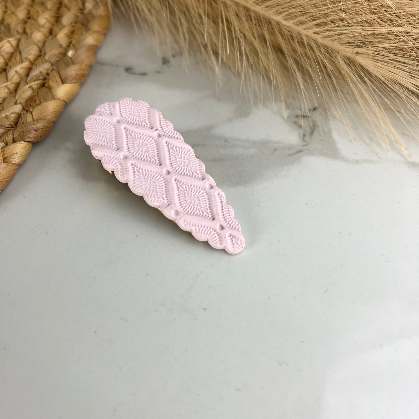 Pince à cheveux en argile polymère à motif rose clair