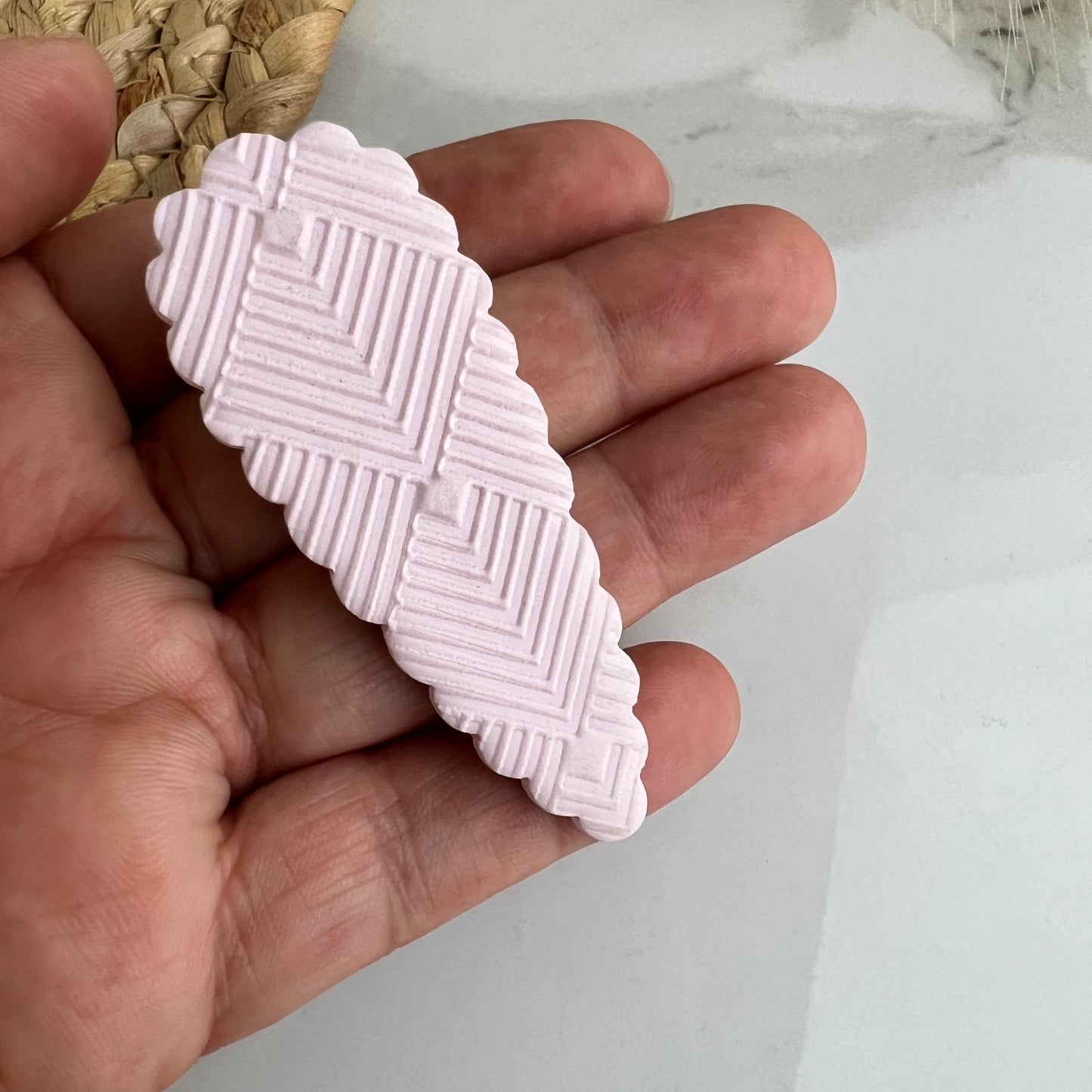 Pince à cheveux en argile polymère à motif rose clair