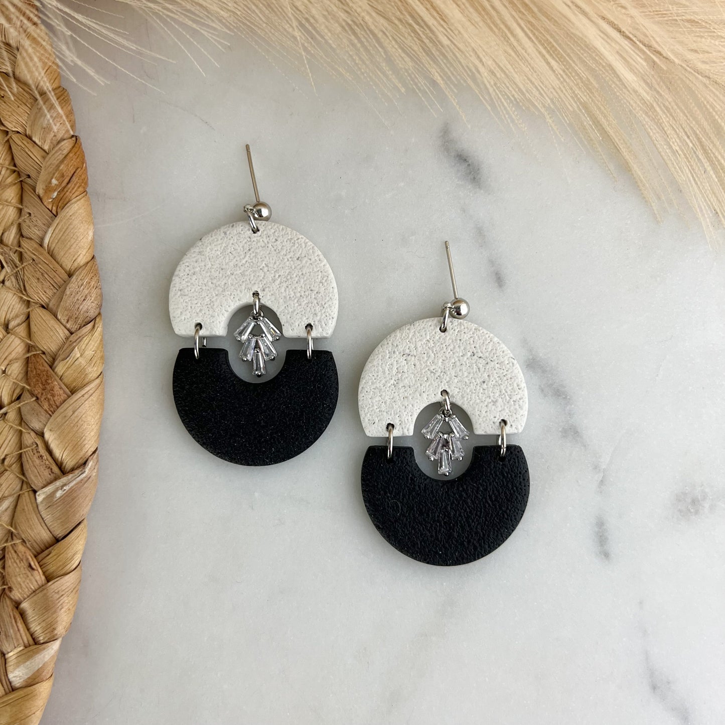 Boucles d’oreilles charmées en argile polymère double arc